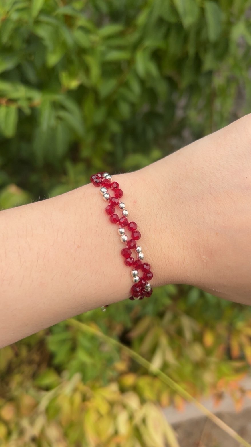 Deep red beaded bracelet with silver and gold bead options