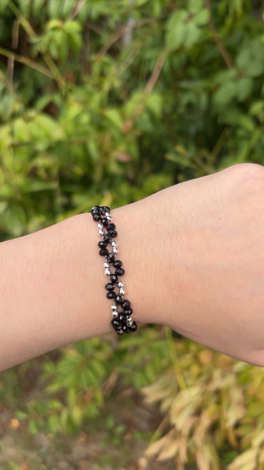Black beaded bracelet with silver and gold bead options