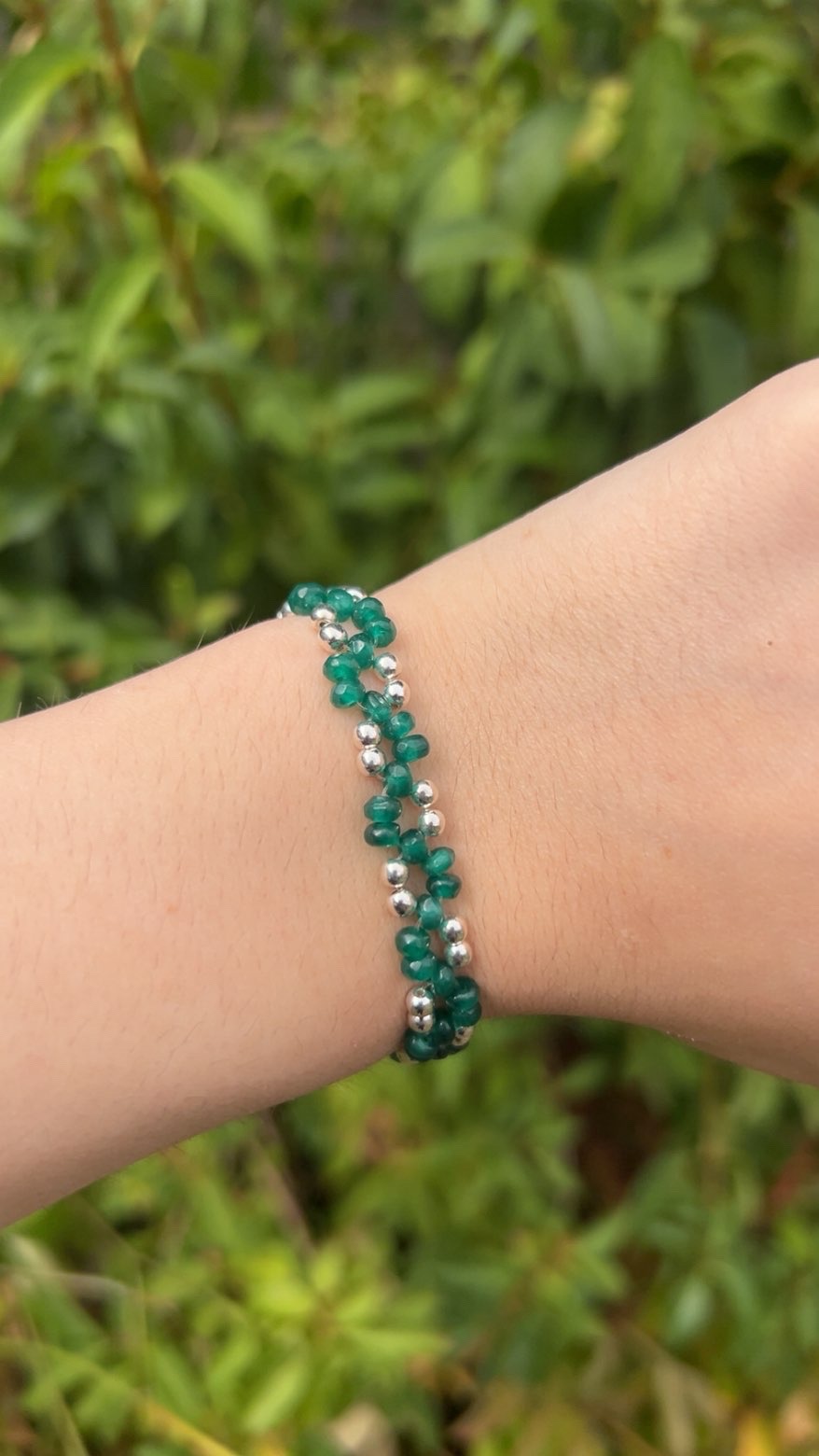 Emerald green beaded bracelet with silver and gold bead options