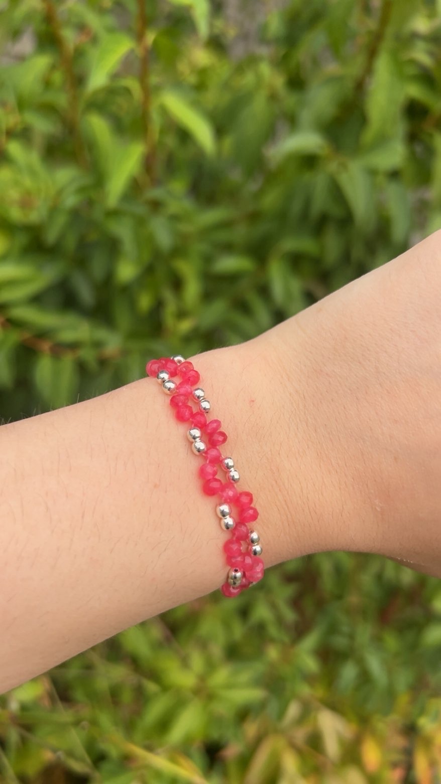 Bright pink beaded bracelet with silver and gold bead options