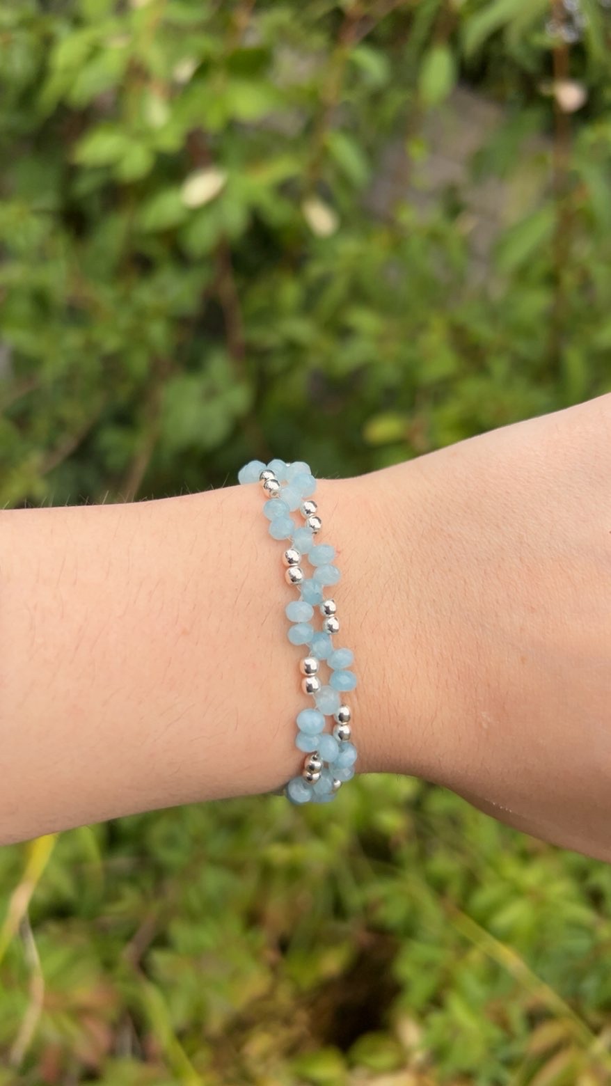 Pale blue beaded bracelet with silver and gold bead options